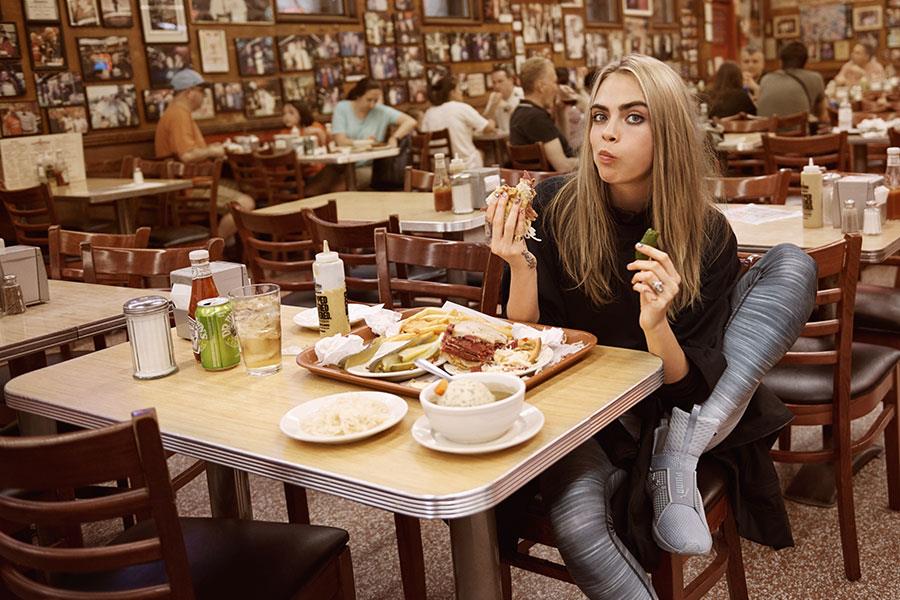 Cara Delevingne eating pastrami sandwich Katz's Puma DO YOU campaign ()