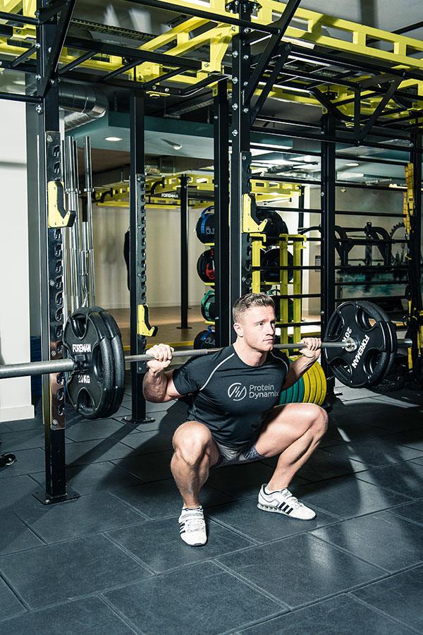 Alex Davies squats leg workout for FS Magazine ()