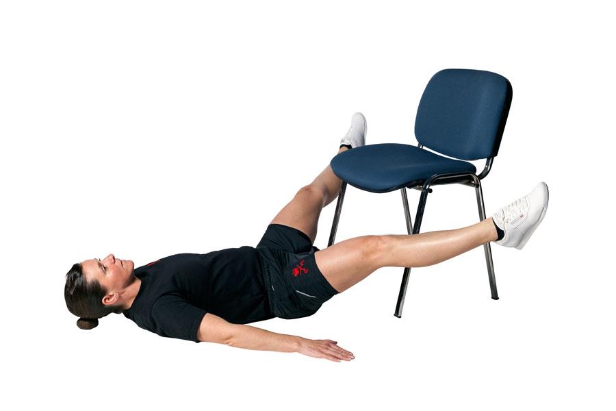 Leg raises chair exercise ()