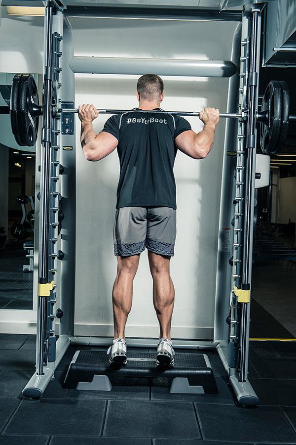 Alex Davies calf raises leg workout for FS Magazine ()