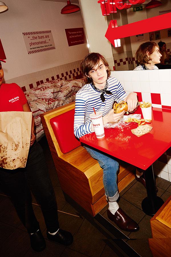 Two guys at Five Guys FS magazine style shoot. Vivien wearing Stone Island jeans from Flannels ()