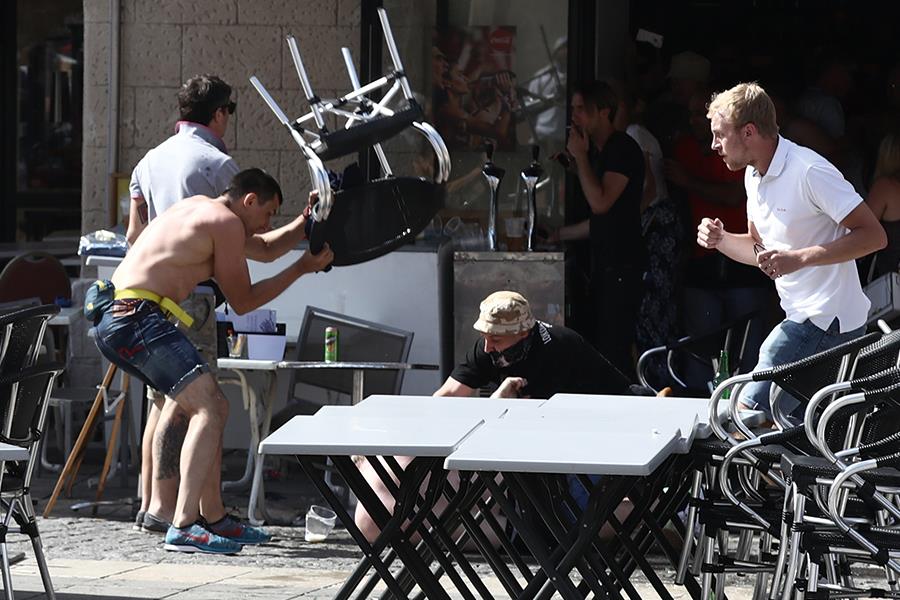 Fan gets hit by a chair at Euro 2016 ()