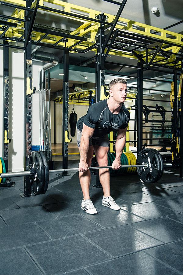 Alex Davies stiff-leg deadlifts leg workout for FS Magazine ()