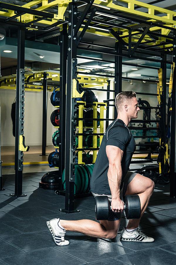 Alex Davies walking dumbbell lunges leg workout for FS Magazine ()